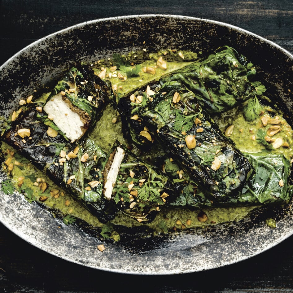 Jerk Tofu Wrapped in Collard Leaves With Crushed Peanuts