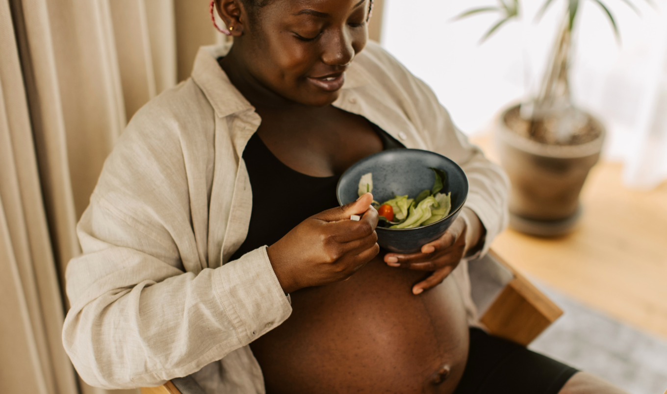 pregnant woman eating healthy food